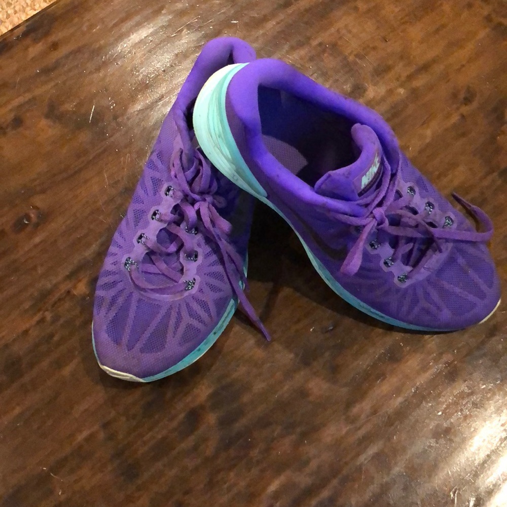 Cute purple and blue nike athletic shoes